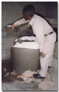 removing the sand from mould